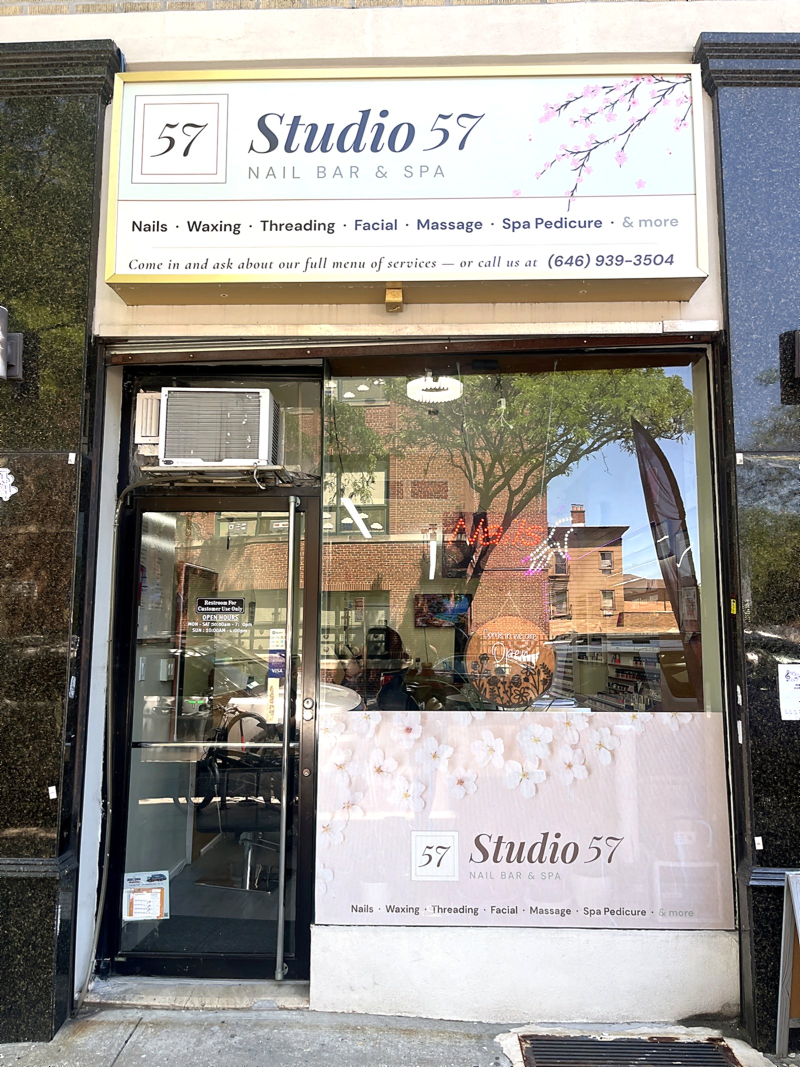 Studio 57 storefront on Woodside Avenue